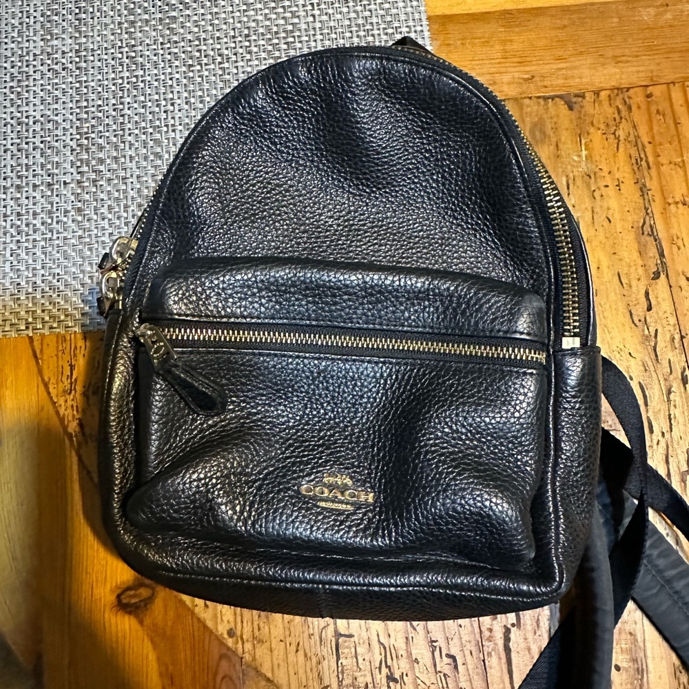 Coach small pebble leather backpack.